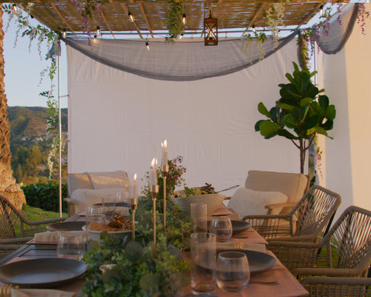 Easy to build Sieger Sukkah kit with kosher bamboo Schach mats and set table with chairs